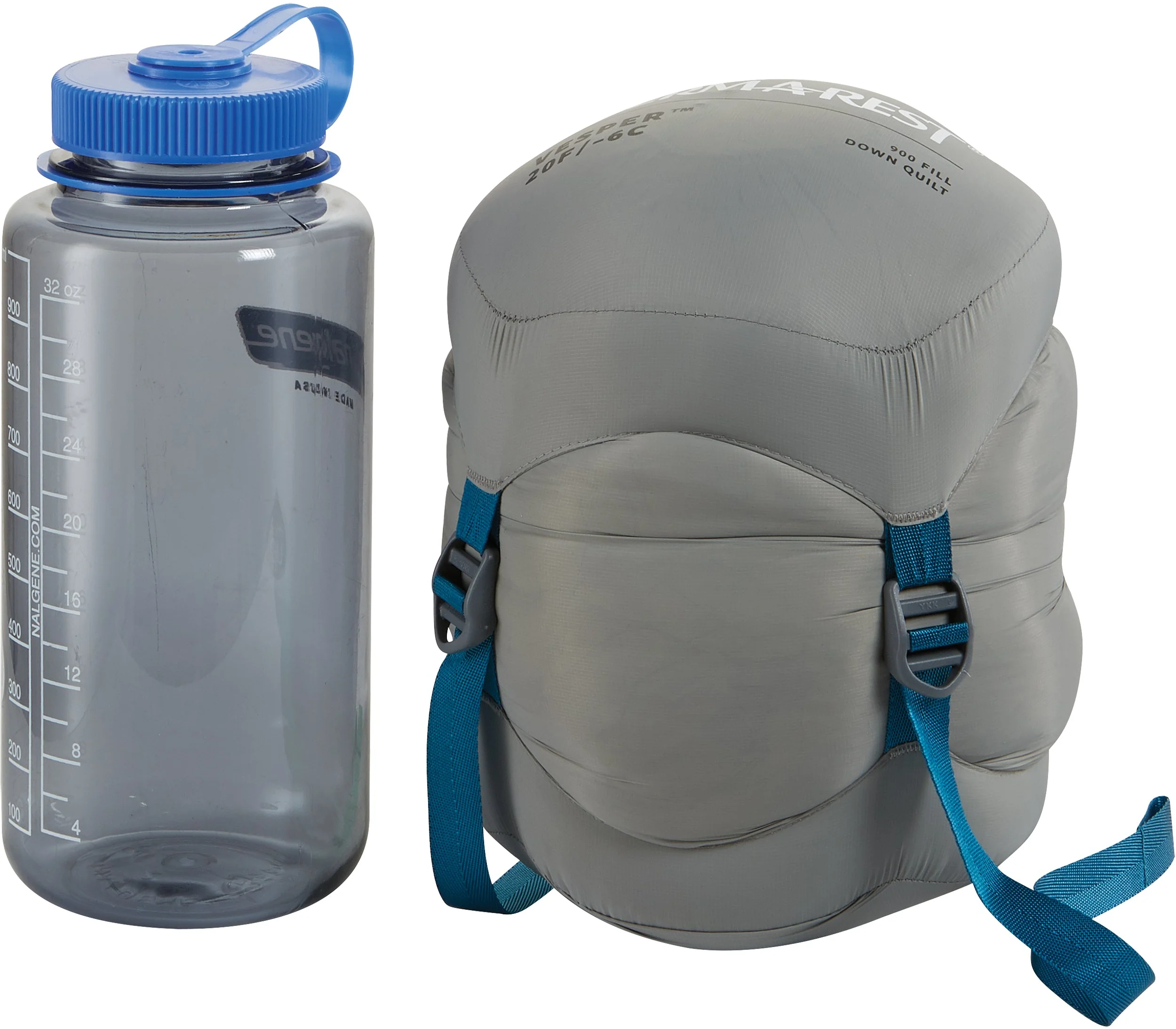 Therm-A-Rest Vesper 20F/-6C Quilt In Cinch sack compressed next to Nalgene Bottle