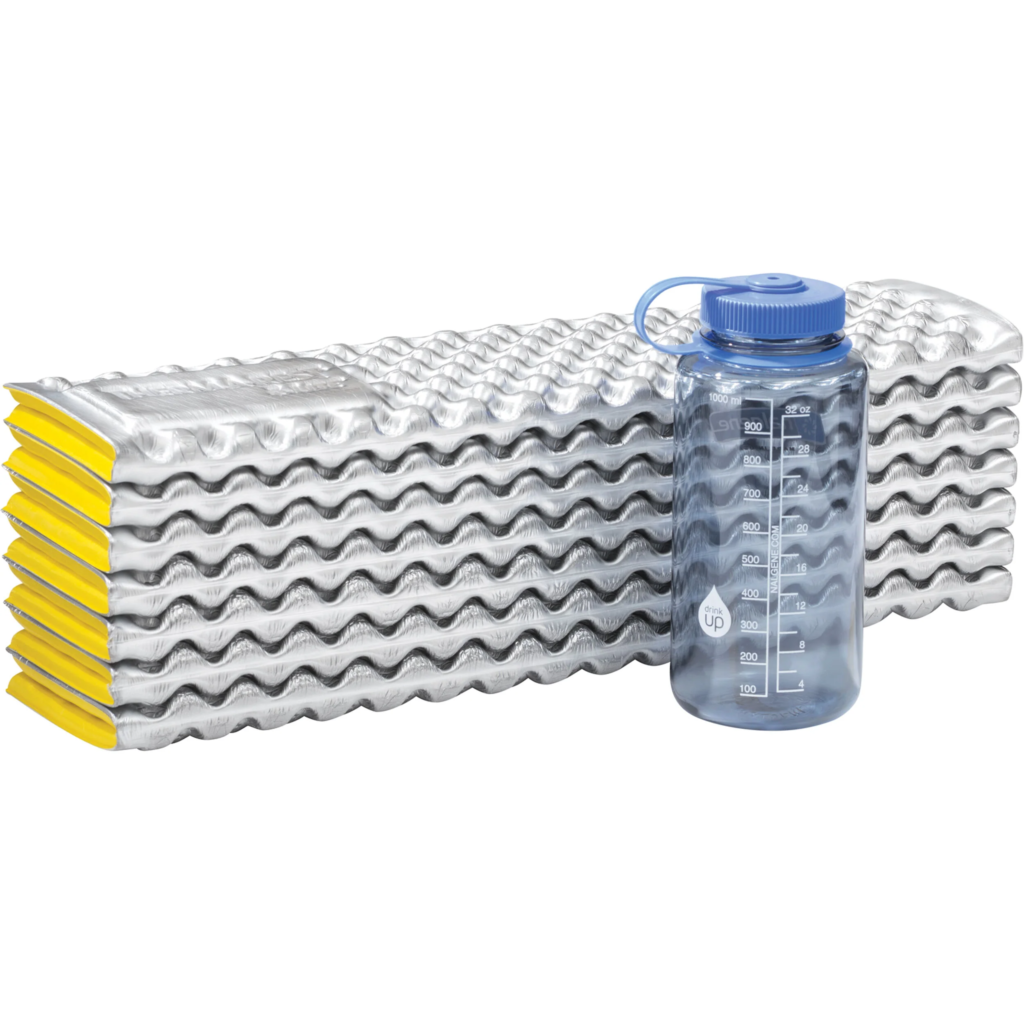 Therm-A-Rest-Z-Lite-Sold-Limon-Silver next to Nalgene bottle for scale
